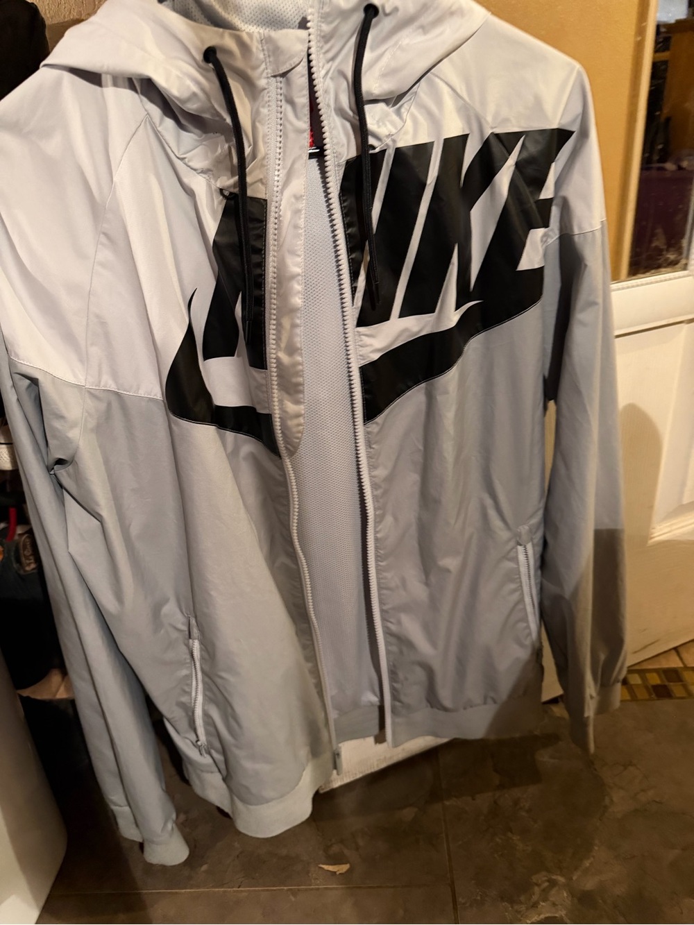Nike Light Gray Hooded Windbreaker with Black Logo
